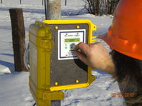 Removing the SD card to evaluate the wind data.