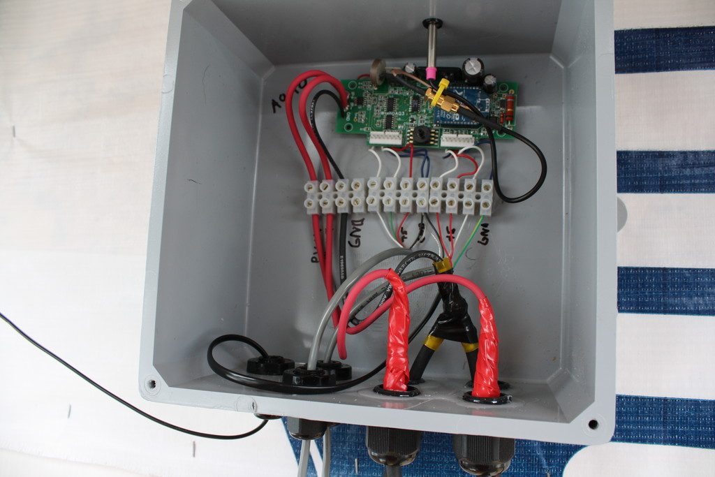 A WrenDAQ3 field modified to act as a weather station for Cordova High School. Attached are a solar insolation sensor, rain gauge, and temperature and relative humidity sensor. It measures battery voltage and current from the 30 watt solar panel mounted above the door.