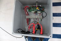 A WrenDAQ3 field modified to act as a weather station for Cordova High School. Attached are a solar insolation sensor, rain gauge, and temperature and relative humidity sensor. It measures battery voltage and current from the 30 watt solar panel mounted above the door.