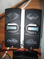 Twin Outback MX60 charge controllers charge the 12 volt battery bank. The MX60's are fed by a 540 watt and 660 watt array.