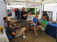 Representatives from APRS World, Chinook Turbines and Midnite Solar