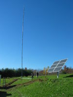 The tower was first raised without the Bergey XL.1 on top. Raising the tower was tricky because most of the guy wires were replaced and the site was not level.
