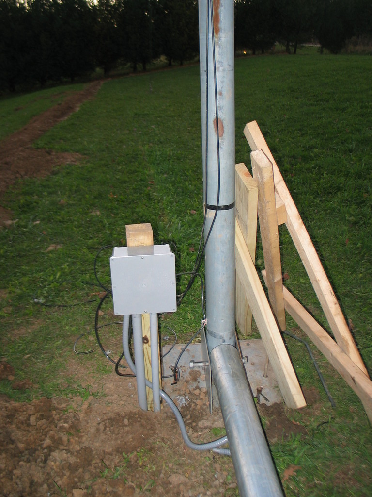 Junction box for power and wind sensor cables. Flexible conduit goes about 5 feet up the tower.
