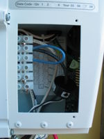 Current transformer installed inside the Magnum inverter. It fit so nicely! The arrow points towards the source.