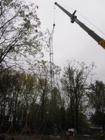 Lowering the 50' stacked with the gin pole.