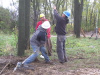 Tensioning a guy wire.
