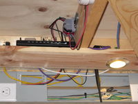 The ThermokSolar sends all measured parameters via a 2.4 GHz 802.15.4 (xbee) link to the box on the right. It receives the signal and converts it to Ethernet. Then the router on the left goes from Ethernet to the Internet via a Spring EVDO broadband wireless connection.
