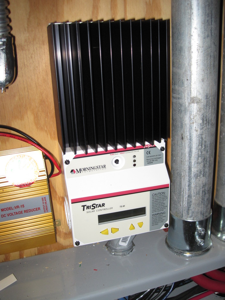 A Morningstar TS-60 dumps energy from the 48 volt Bergey battery bank into special 48 volt hot water heater elements. The Tri-Star is controller by the ThermokSolar-4A to prevent it from boiling the water in the tank.