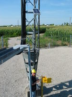 James Jarvis of APRS World terminates the anemometer wiring into the surge protector box.