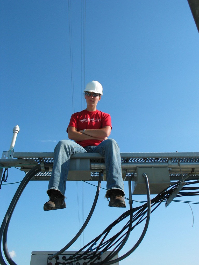 Alyssa Anderson climbed up on the ice bridge to check antenna alignment.