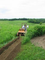 Trenching for the 60 amp 240 volt service. 