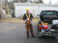 James Jarvis preparing to climb a tower.