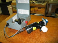 Completed motor assembly and in progress controller. The PVC cap presses on to a steel mandrel.