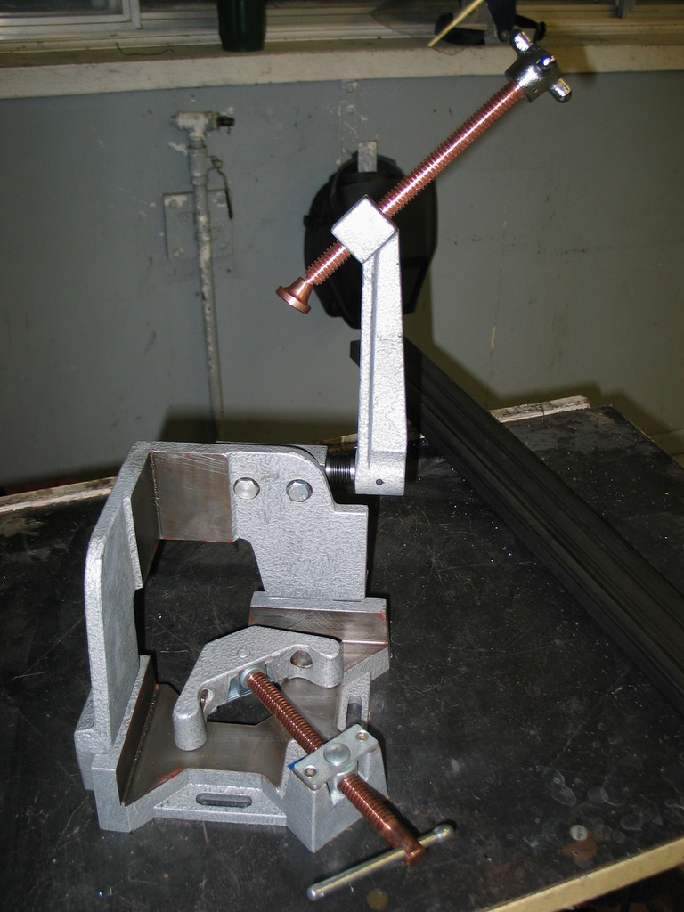 Corner welding fixture. Very nice for making square joints without a lot of setup fuss. Expensive, but worth it.