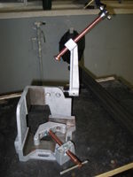 Corner welding fixture. Very nice for making square joints without a lot of setup fuss. Expensive, but worth it.