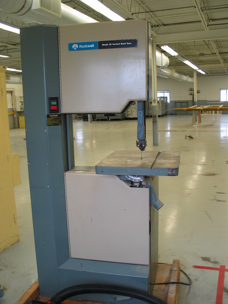Wood, plastic, and non-ferrous metal cutting band saw. It's really nice. It doesn't even slow down when resawing 4" thick stock. 

A Variable Frequency Drive (VFD) and 3HP 3 phase motor have been procurred. Once I figure out how to best drive it, I'll make put the parts on and make it variable speed.