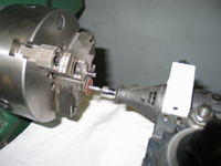Dremel tool post grinder cutting some snap ring grooves in hardened steel shaft.
