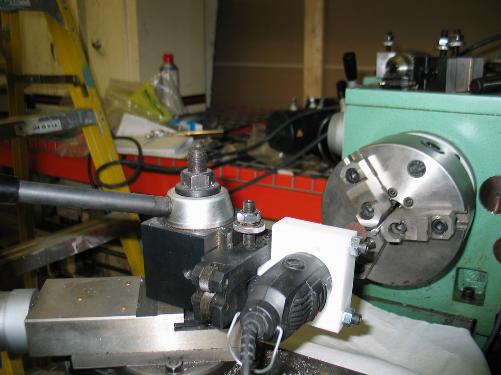 The 30 minute "tool post grinder". Mount was machined from some scrap plastic (probably HDPE).