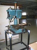 Taiwanese mill / drill machine. It's better than a sharp stick in the eye, but not by much...