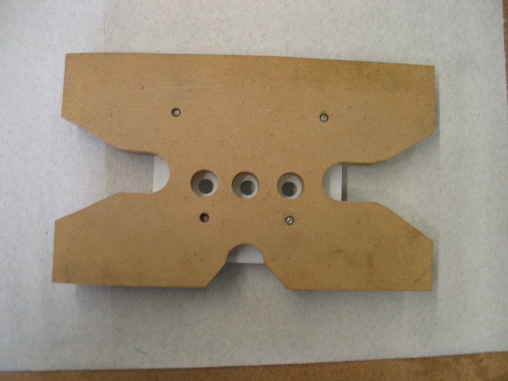 Countersinking jig for Wind Data Logger bezels. The slots are for the operators fingers to reach under and pop the bezel off.