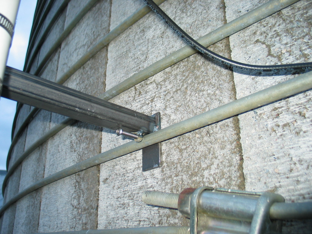 Close-up of attachment to silo band. It's not pretty, but it works.