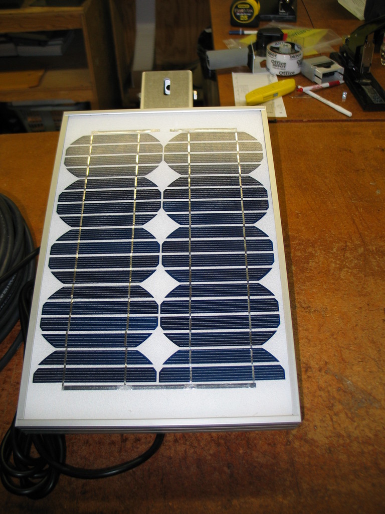 10 watt solar panel on pole / wall mount.