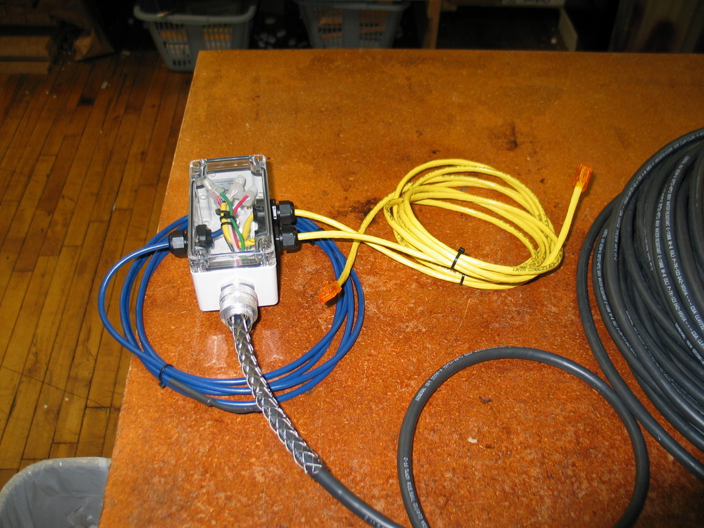 Breakout box for underwater cable. This box joins the temperature sensor and two anemometers to the underwater cable. It also features a clamp on the back to allow it to be attached to the mast on the bouy.