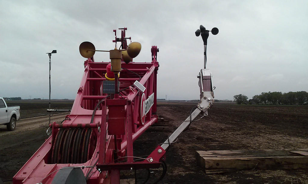 APRS World's #40HC anemometer (APRS6506) extends off to right using pivoting head mount (APRS7602) vs. unreliable factory supplied anemometer in front