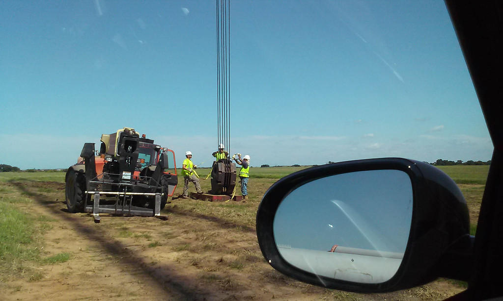 Crane booming down